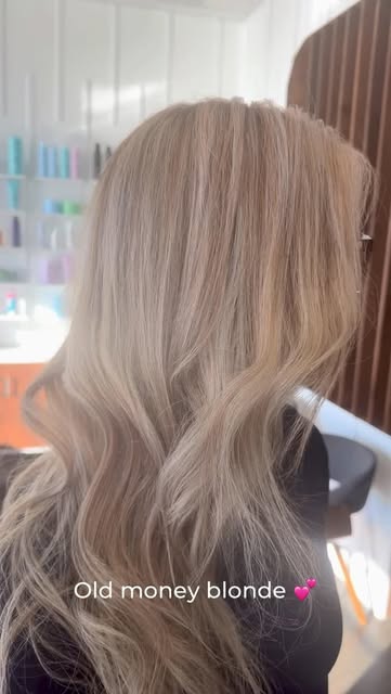 Soft dimensional blonde waves created at Elisa’s Hair Studio